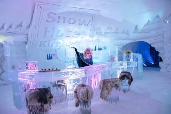 Sleeping hall of snow with an ice bed and carved side walls